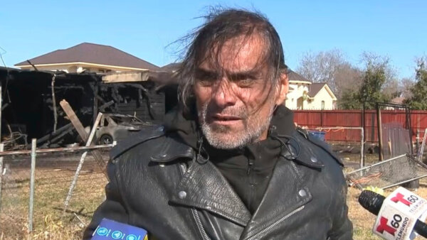 Jonathan Joss talks to reporters following a fire at his San Antonio, Texas, home