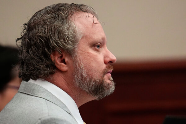 James Craig sits in court