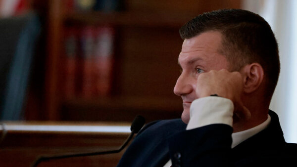 Yuri Bukhenik sits in court