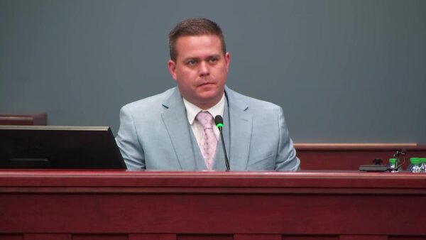 Defendant A.J. Scott testifies