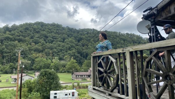 tya adams on a balcony