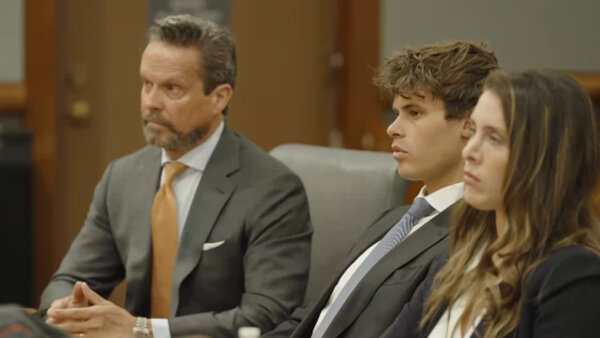 Fraser Michael Bohm (center) and his defense attorney, Alan Jackson (L), appear in court