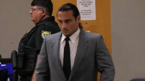 Daniel Stearns in a grey suit