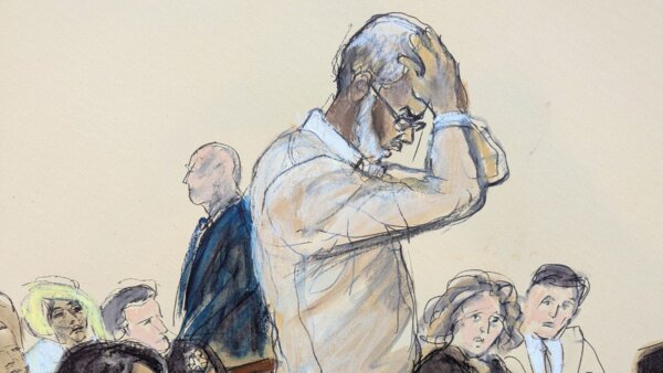 In this courtroom sketch, Sean Diddy Combs reacts as he makes a statement