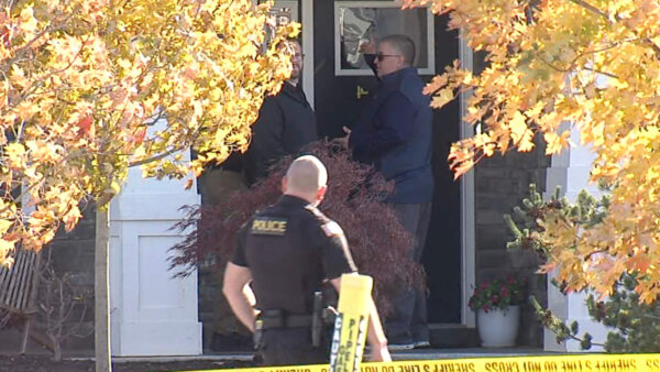 investigators outside house