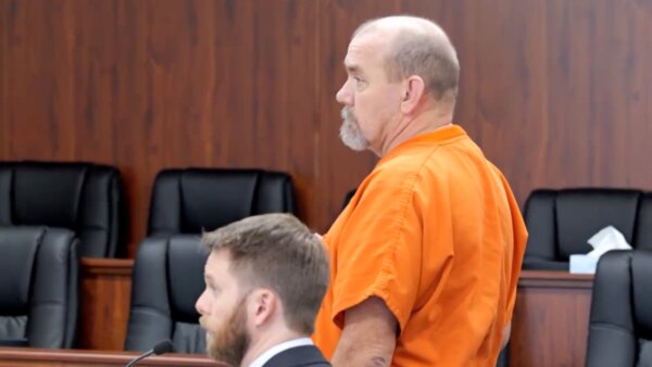 Delbert Cornish stands in court