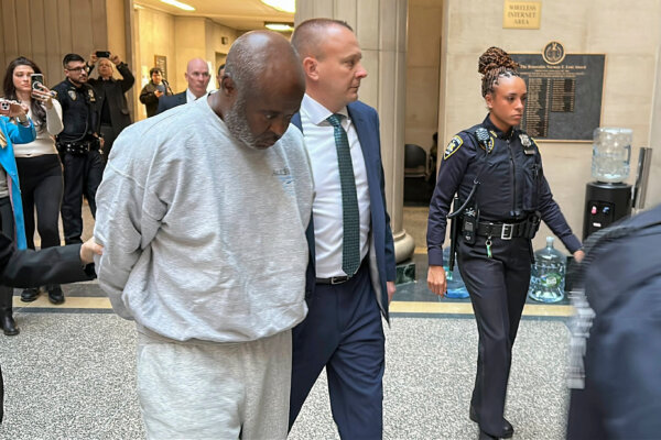 man led into court