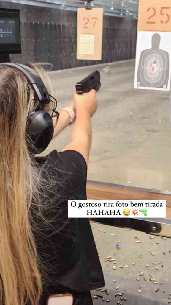 Girl shooting at firing range