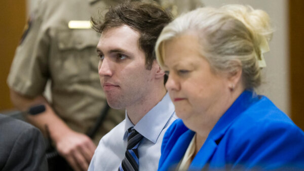 Tyler Robinson sits in court