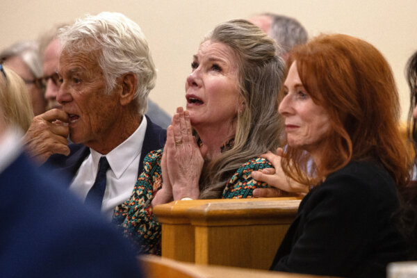 Melissa Gilbert reacts as her husband Timothy Busfield is granted a conditional release