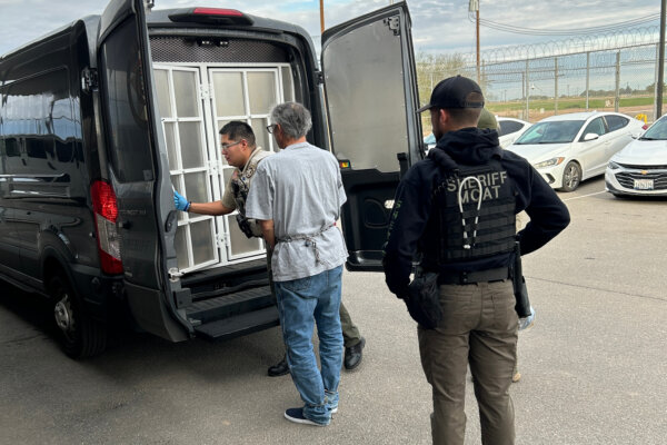 Michael Abatti, center, is transported from the Imperial County Jail in El Centro, Calif