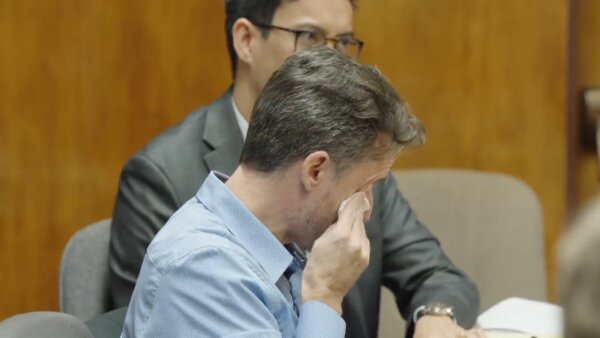 Gerhardt Konig cries during opening statements