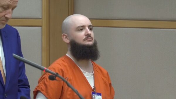 Shelby Nealy stands at sentencing