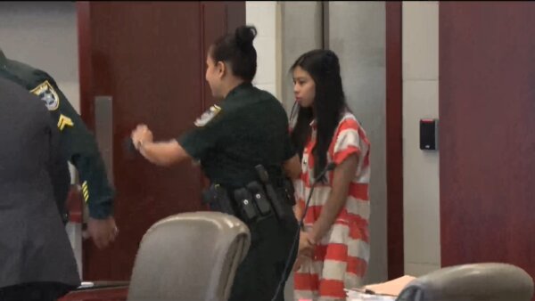 Anne Mae Demegillo walks into court