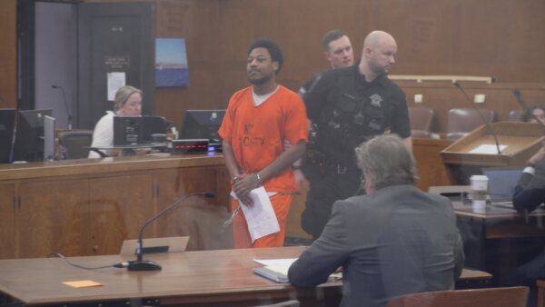Quintell Collins walks into court