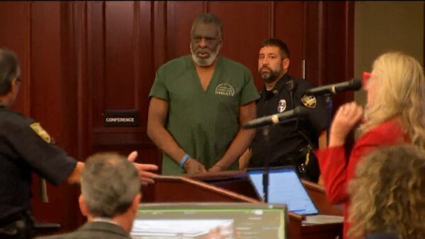 Henry Tenon walks into court