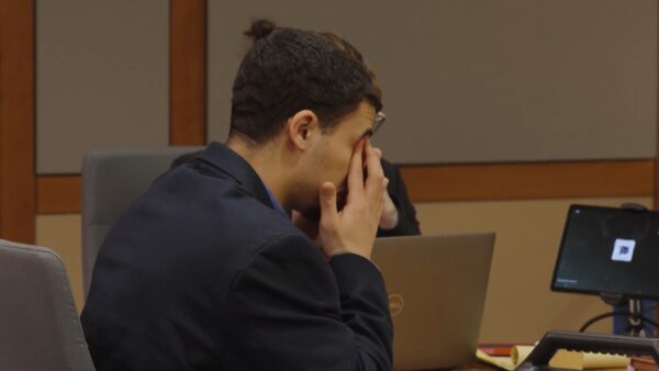 Zarrius Hildabrand cries while his mother testifies