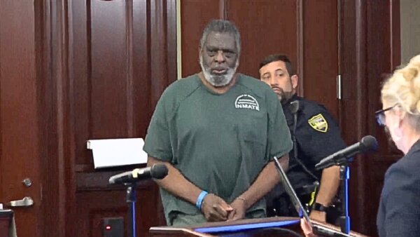 Henry Tenon enters court